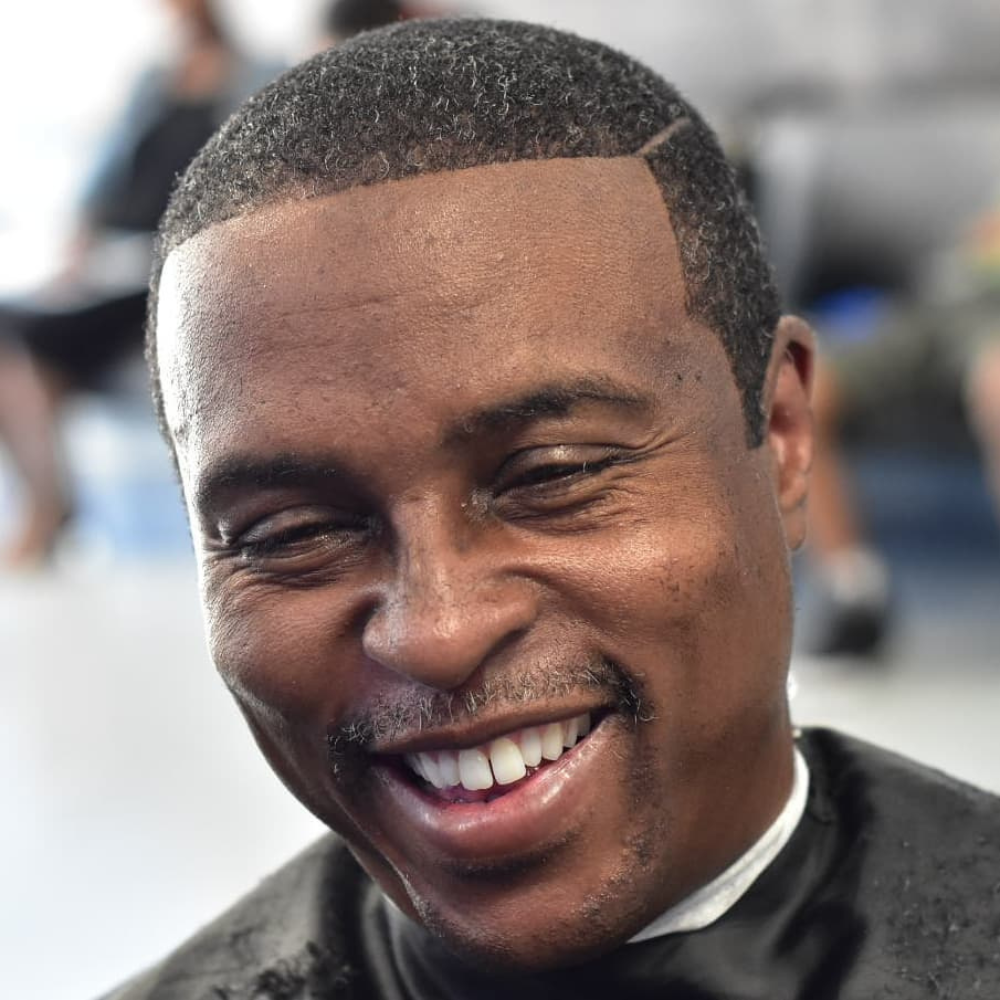 middle aged black male smiling